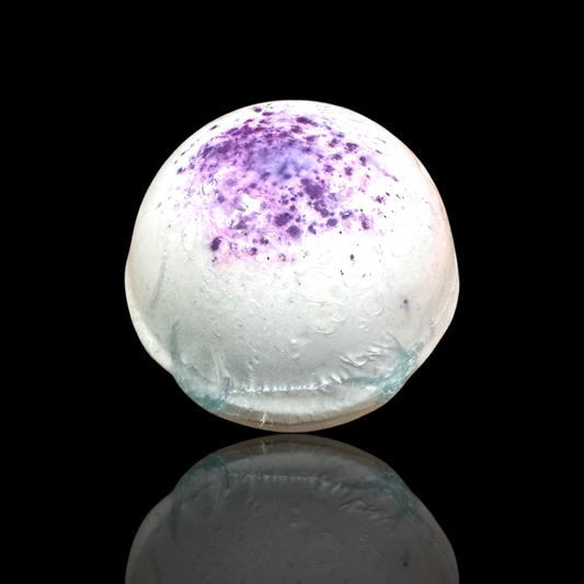 Purple Girls night out bath bombs with mid summer night scent. receive one randomly selected bath bomb with a fabulous colored top in either pink, purple or blue. buy 1 or bundle and save with a buy 2 get 1 free.